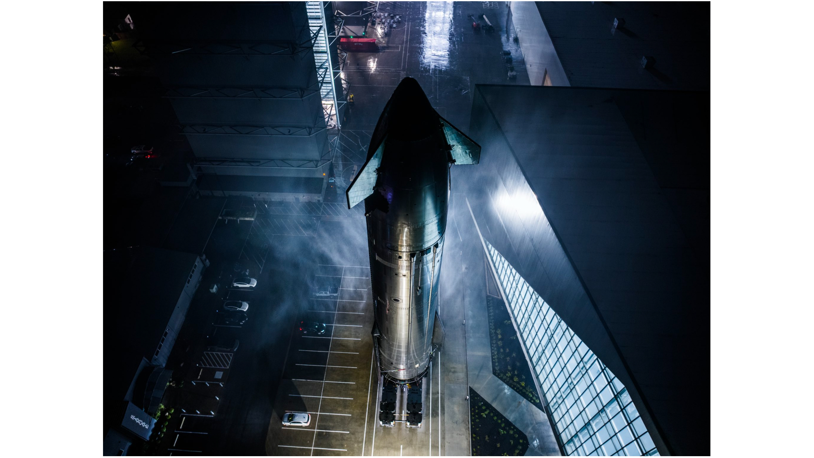 The upper stage of SpaceX's Starship megarocket rolls out to the launch pad at the company's Starbase site on Jan. 9, 2025 ahead of a planned Jan. 13 test flight.