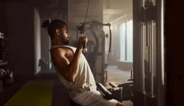 A man performing a lat pulldown