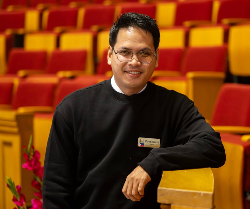 Domie Dave A. Daplin poses for a photo as global members of The Tabernacle Choir at Temple Square discuss their musical histories and how they feel about the opportunity to be members of the choir, during an interview in the Tabernacle in Salt Lake City on Tuesday, Sept. 23, 2025.