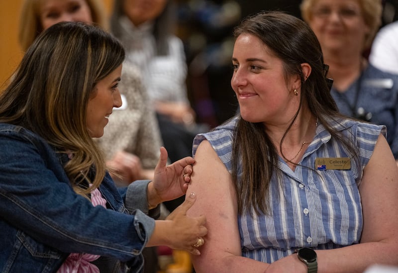 Thalita Carvalho, left, looks over at Celeste Temple. They were among global members of The Tabernacle Choir of Temple Square who discussed their musical histories and how they felt about the opportunity to be members of the choir, during an interview in the Tabernacle in Salt Lake City on Tuesday, Sept. 23, 2025.