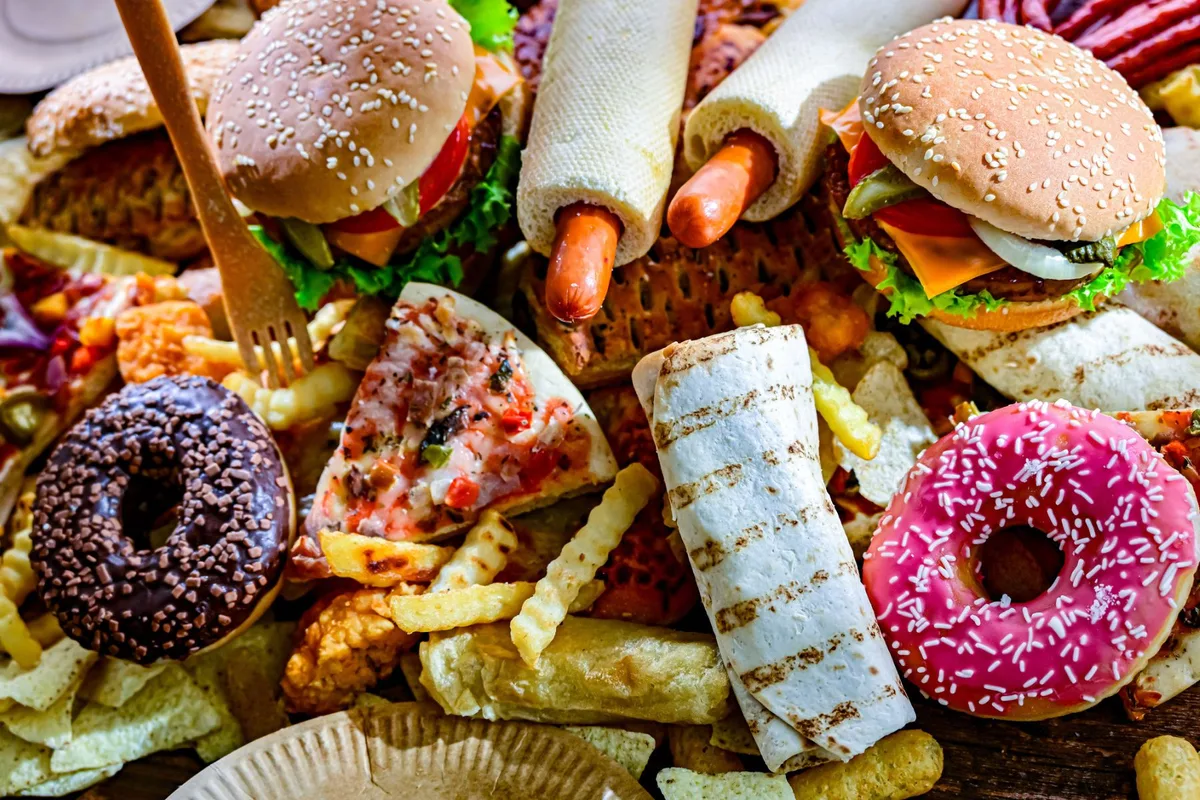 Foods high in saturated fat, including doughnuts, pizza, burgers, hotdogs and other takeaway food