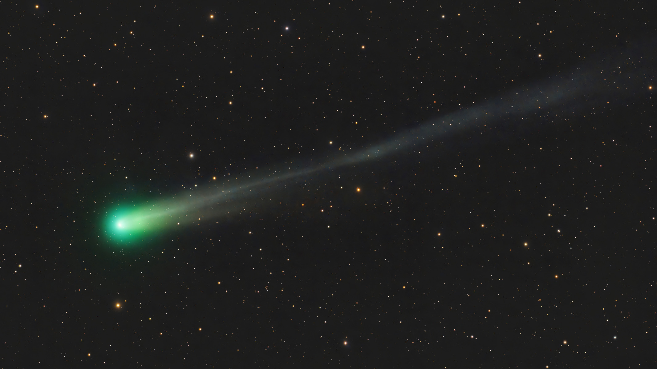 comet Lemmon streaking across the sky