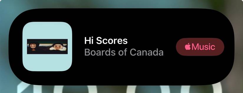 A Shazam result in an iPhone Dynamic Island.