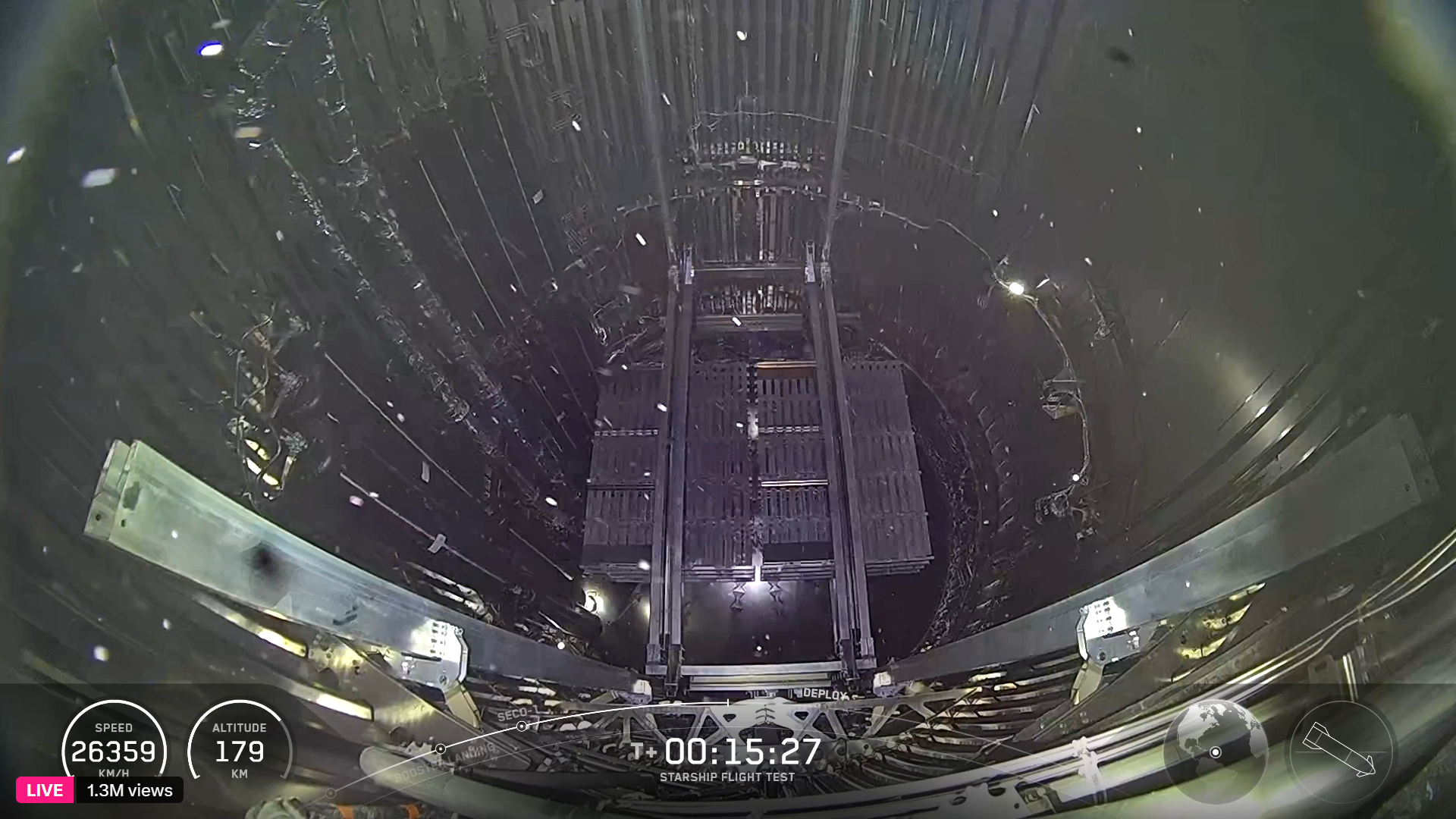 A dark payload bay with bits floating about.