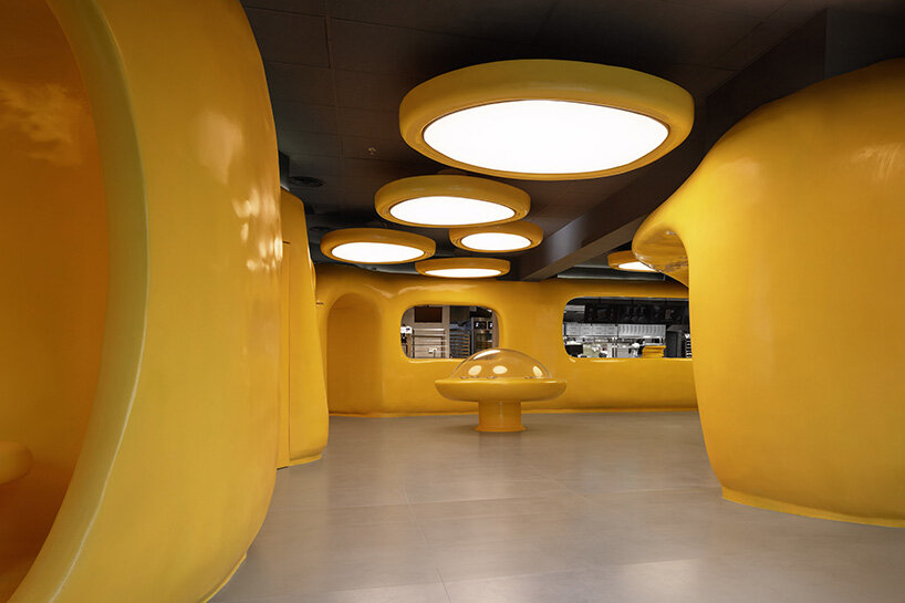 crosby studios composes bright yellow alien habitat for dessert shop in jakarta