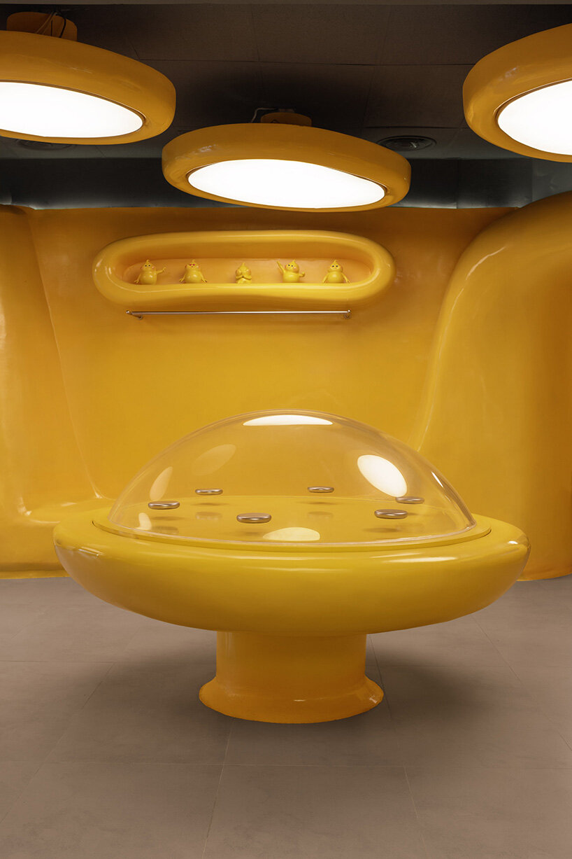 crosby studios composes bright yellow alien habitat for dessert shop in jakarta