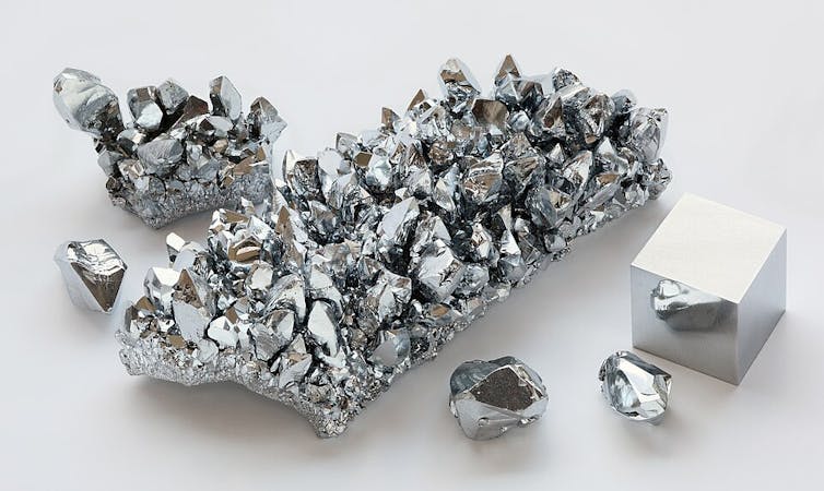Chromium crystals in the shape of jagged chunks and as a cube