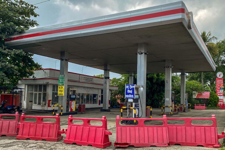 barriers outside closed petrol station in Sri Lanka.
