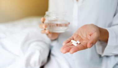 Woman taking magnesium for sleep