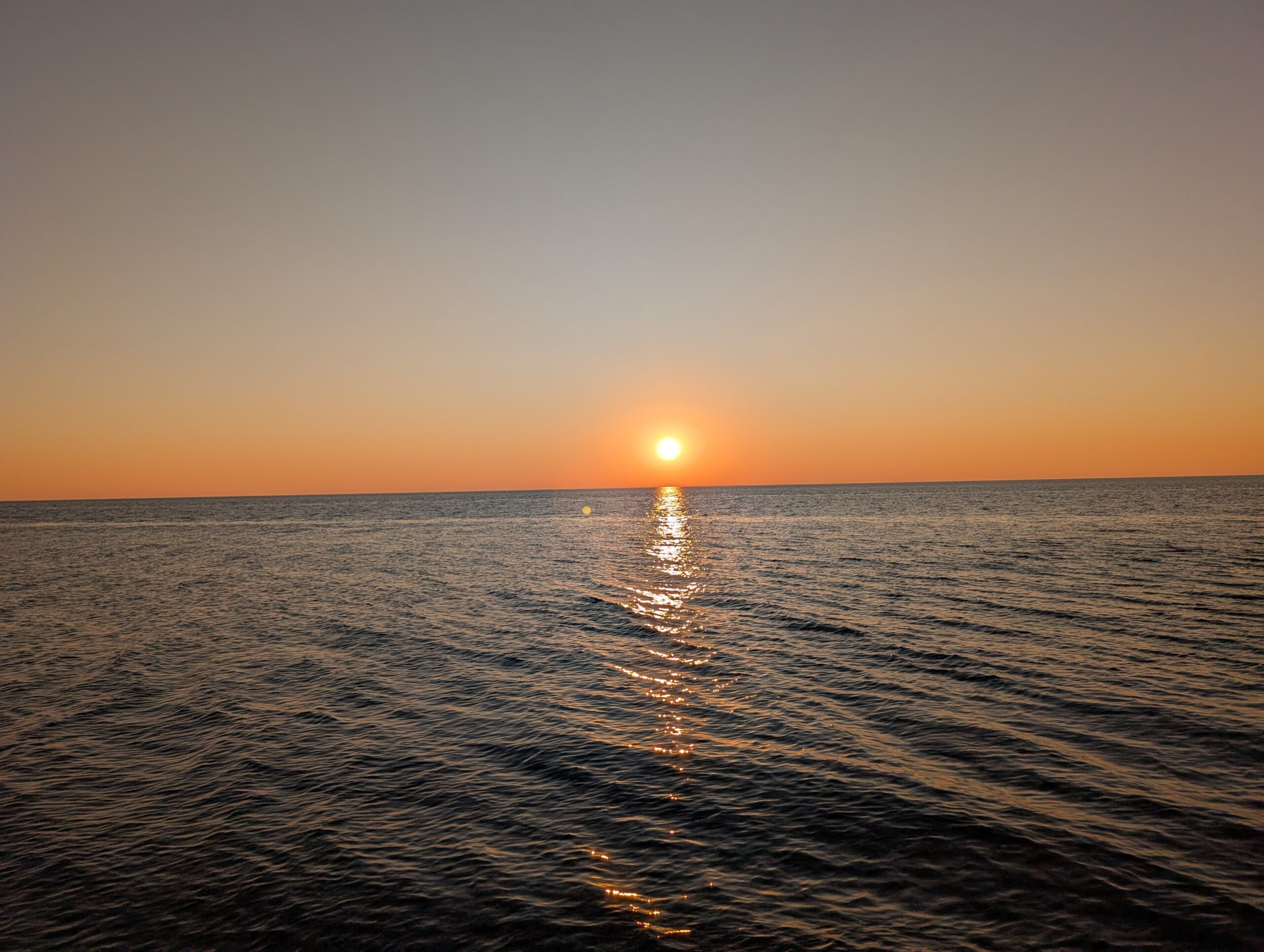 Picture of a sunset over a lake, taken with the Pixel 9 Pro.