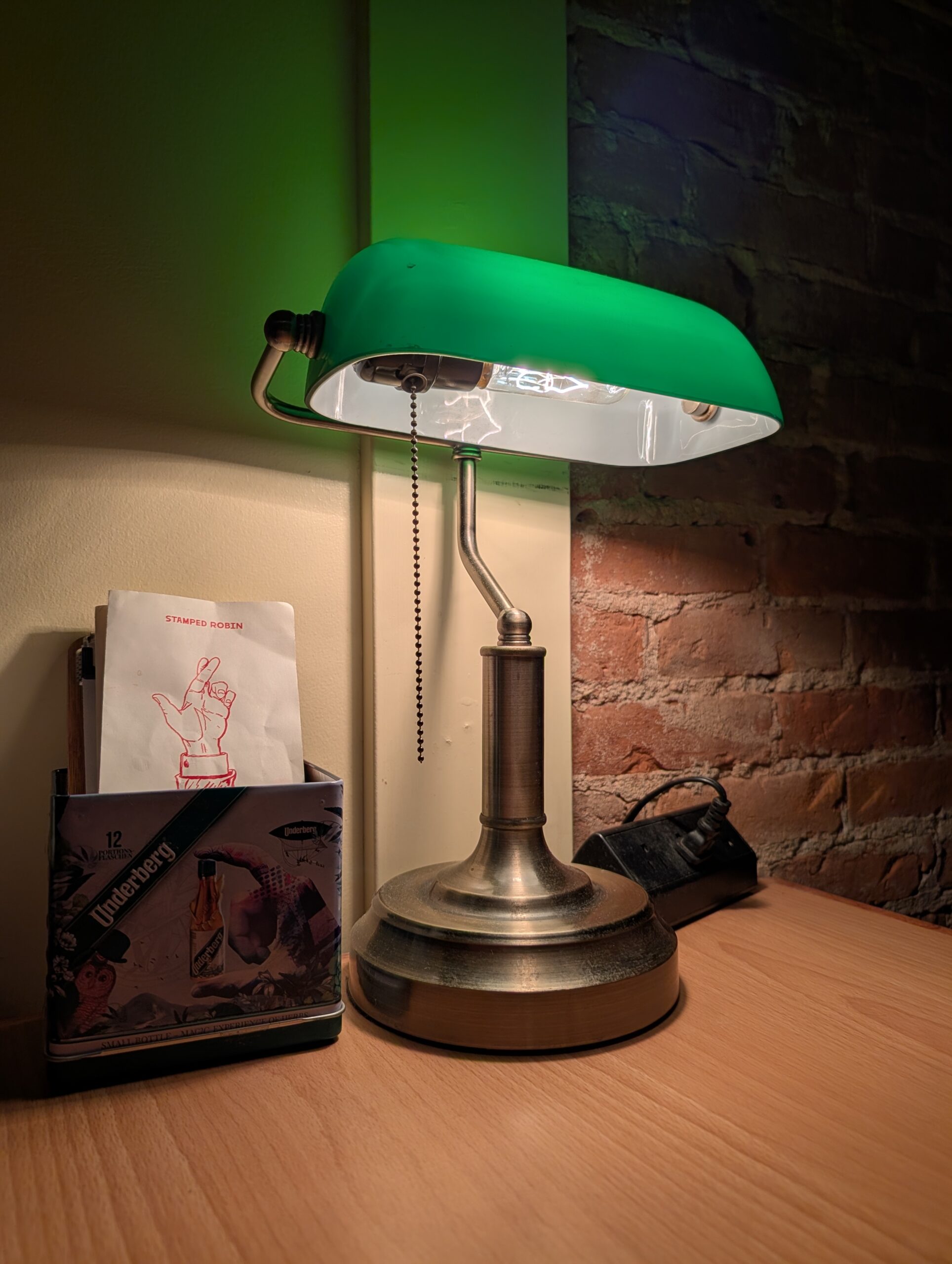 Photo of a lamp in a dimly-lit bar, taken with the Pixel 10 Pro.