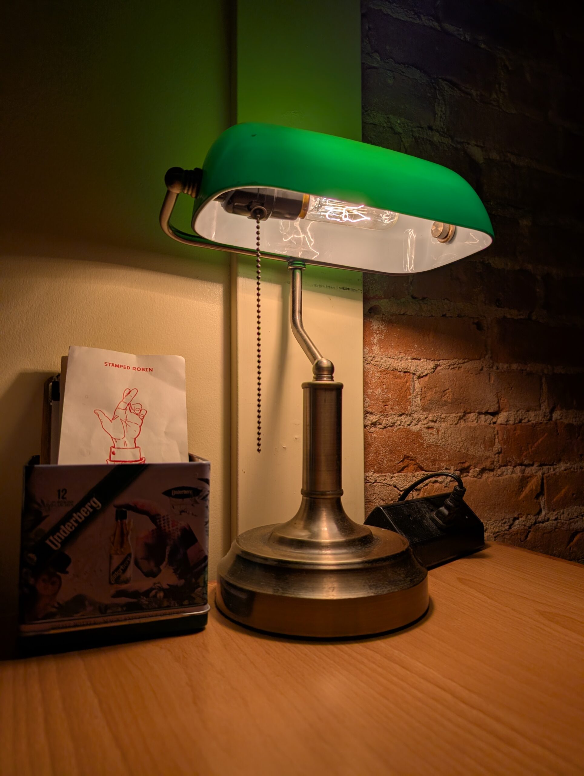 Photo of a lamp in a dimly-lit bar, taken with the Pixel 10 Pro.