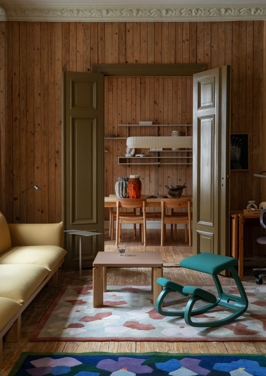 Wood panelled lounge with colourful stool from Zeitgeist 2.0 exhibition at Hos Paul for Designers' Saturday 2025