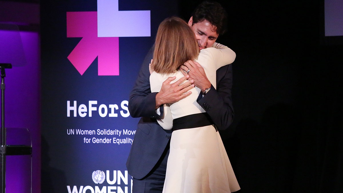 Former Canadian Prime Minister, Justin Trudeau, and actress, Emma Watson, hugging on stage at the HeForShe 2nd Anniversary Reception in October 2025.
