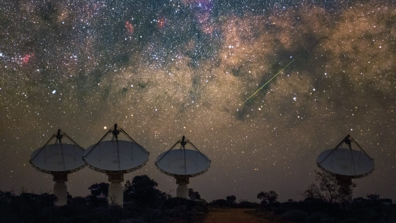 A photo of several ASKAP antennae pointing toward the night sky