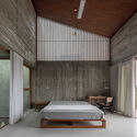 Vertical Tube House - Kam and Ly House / HGAA + Jien Jun + naïve practice + Taewon Park - Interior Photography, Bedroom, Wood