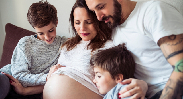 family and pregnant mother