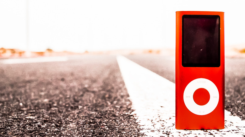 A red iPod on the side of the road