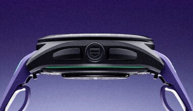 Side view of a black digital watch with a purple strap and a green accent line on the case.