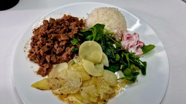Rehydrated stir fried beef and potatoes, with fresh greens from the onsite greenhouse.