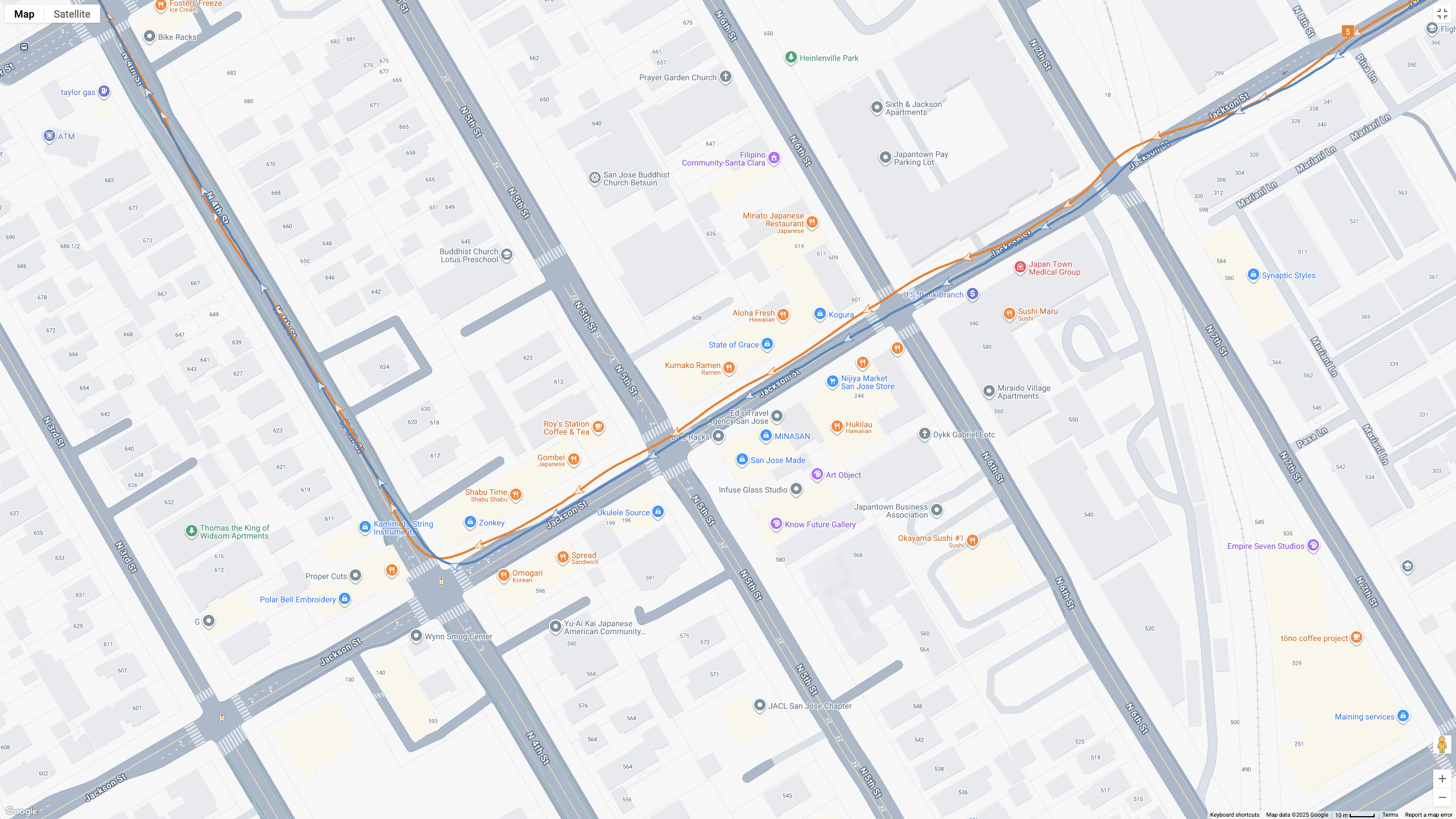 A GPS map showing how the Garmin Forerunner 970 (blue line) and Google Pixel Watch 4 (orange line) compare for a half-marathon test.
