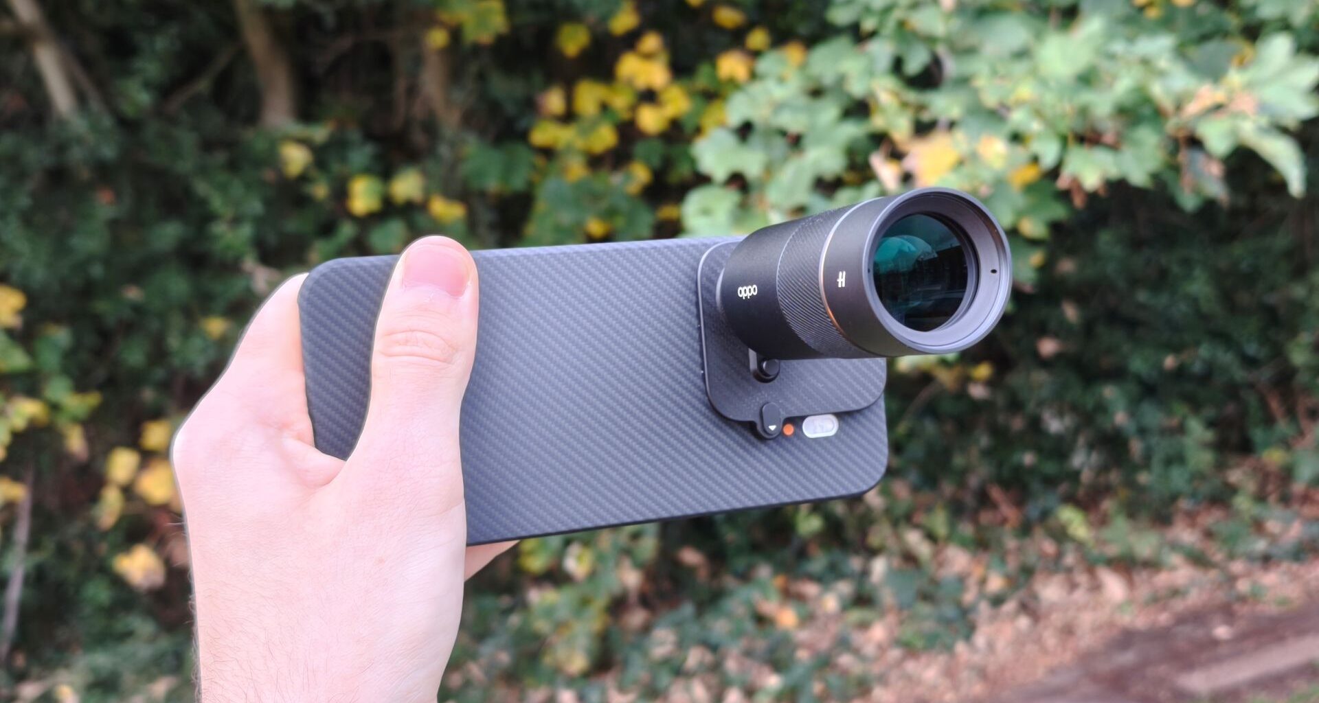 The Oppo Find X9 Pro with the Hasselblad lens extender attachment