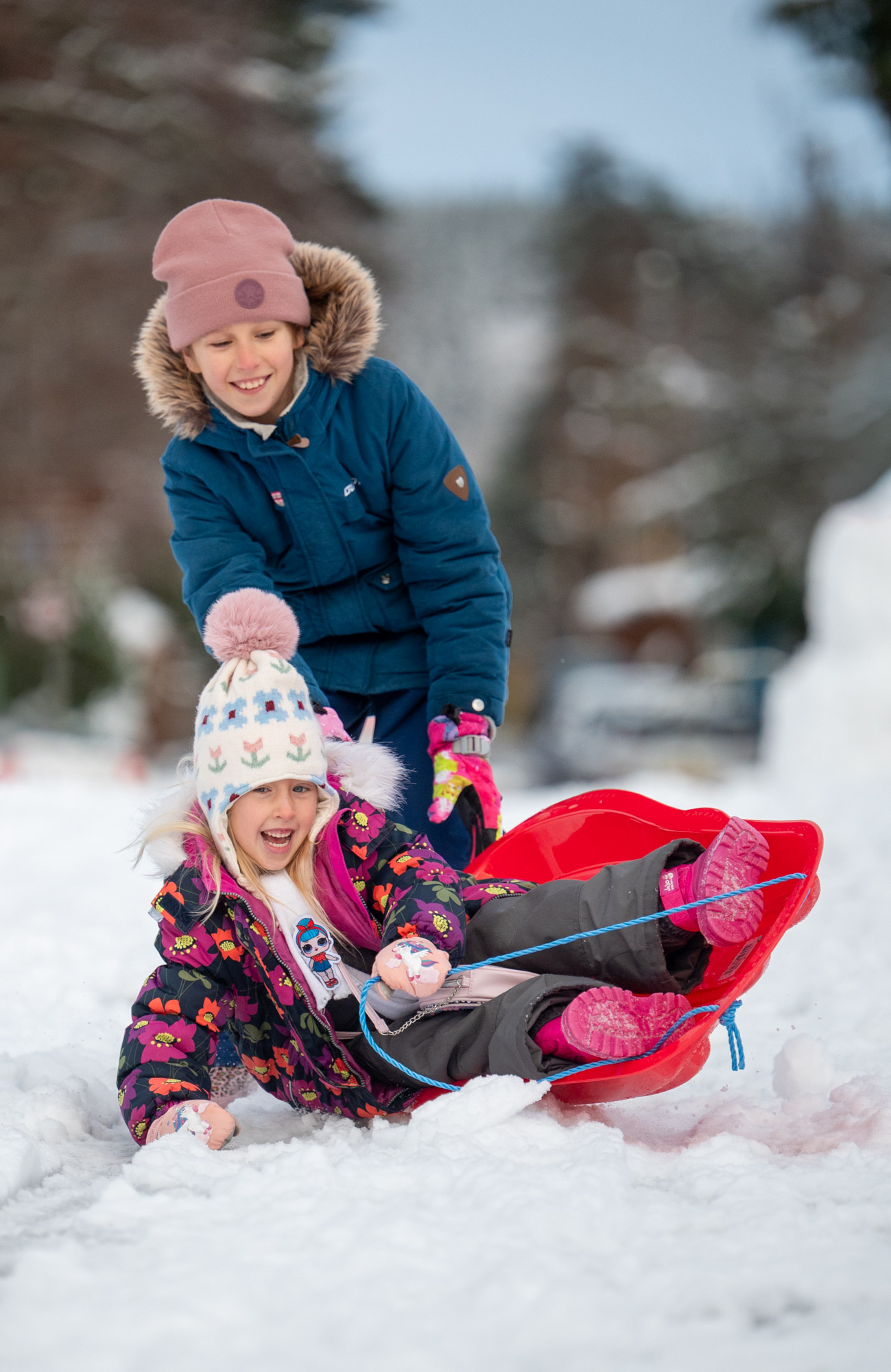Zoi Wilson and Eliana Wilson playing in the snow in Aboyne, Aberdeenshire.