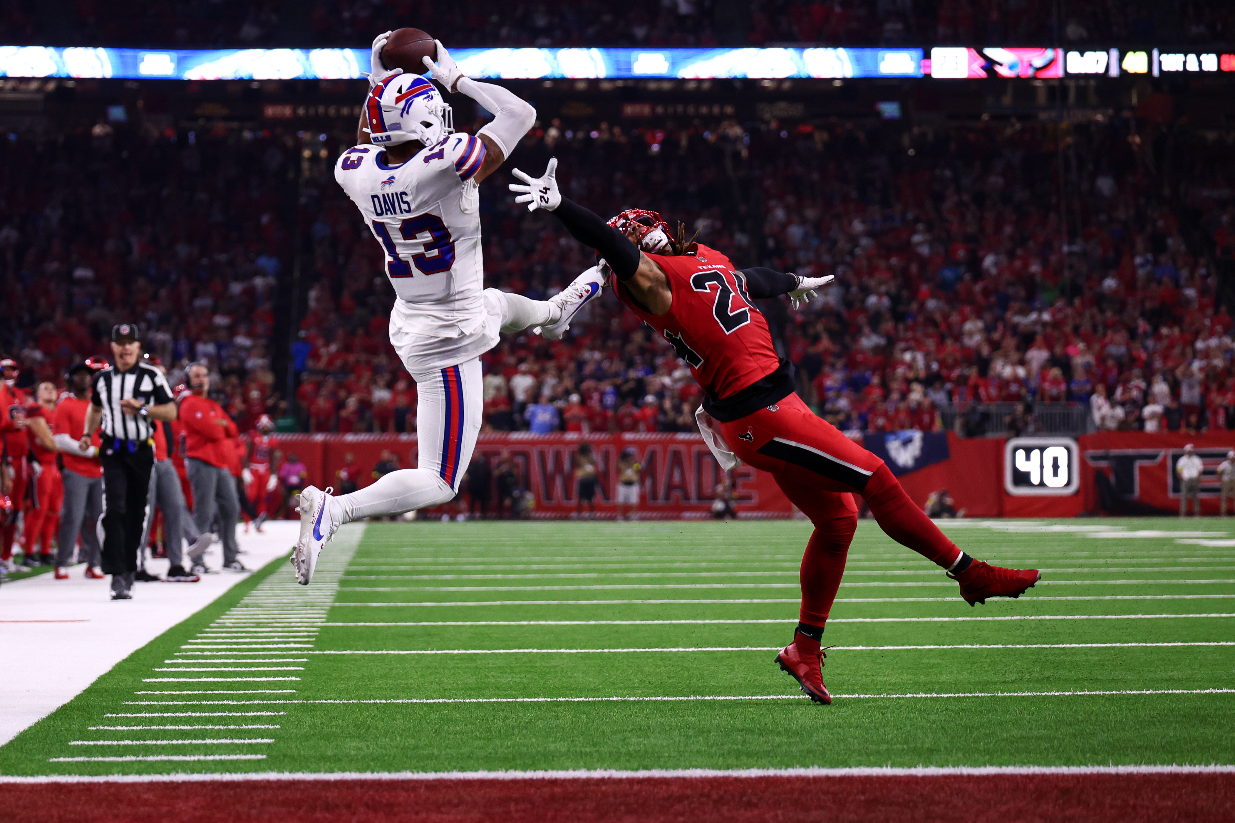 Gabe Davis of the Buffalo Bills attempting to catch a pass against the Houston Texans.