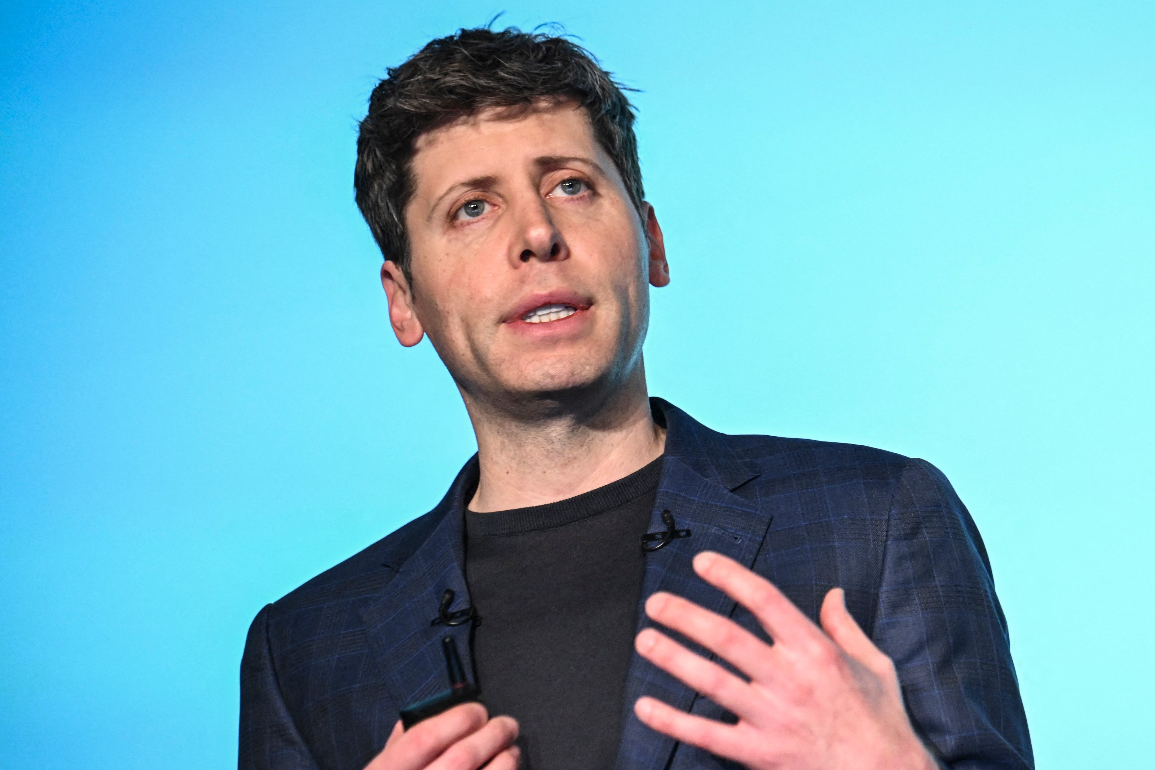 OpenAI CEO Sam Altman speaks at a press conference.