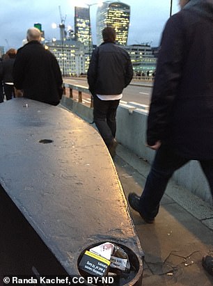 Here, a cigarette packet is wedged into the crevice of a barrier at London Bridge