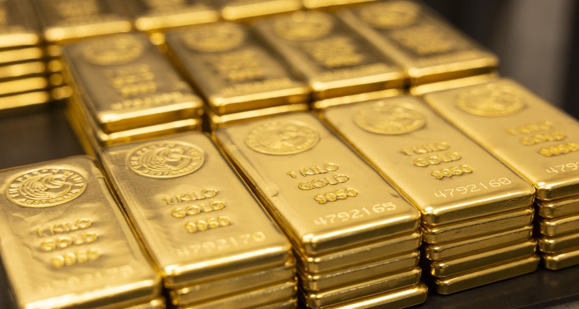 Gold subdued as dollar firms; spotlight on Fed minutes, U.S. jobs data