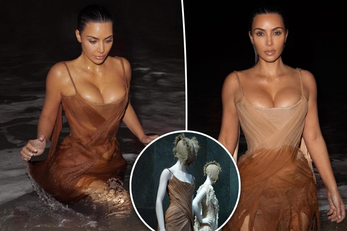 Kim Kardashian swims in the ocean wearing historic Alexander McQueen dress shown at the Met