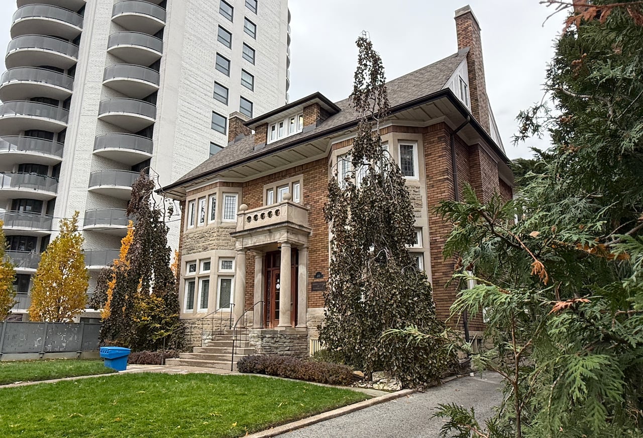 An old stone house that is now home to the Ontario College of Pharmacists.