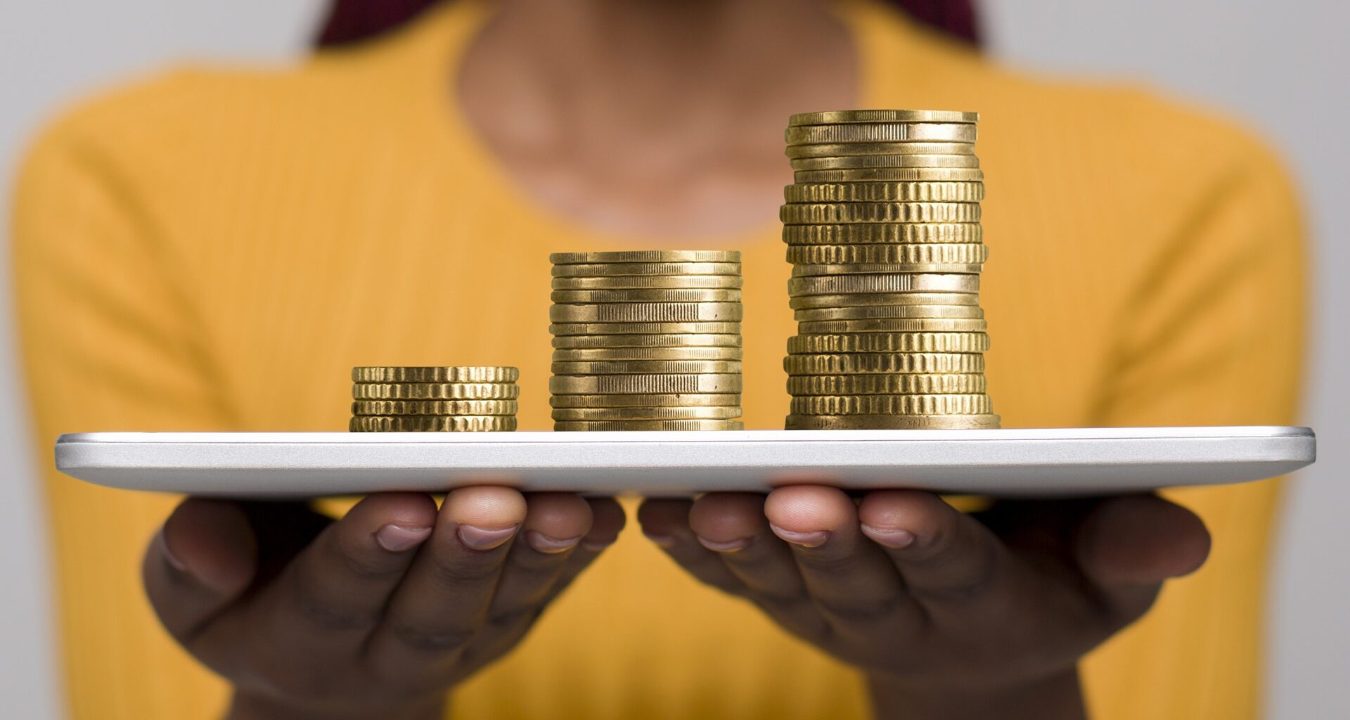 Woman with tablet proposing to earn money in the Internrt stock photo