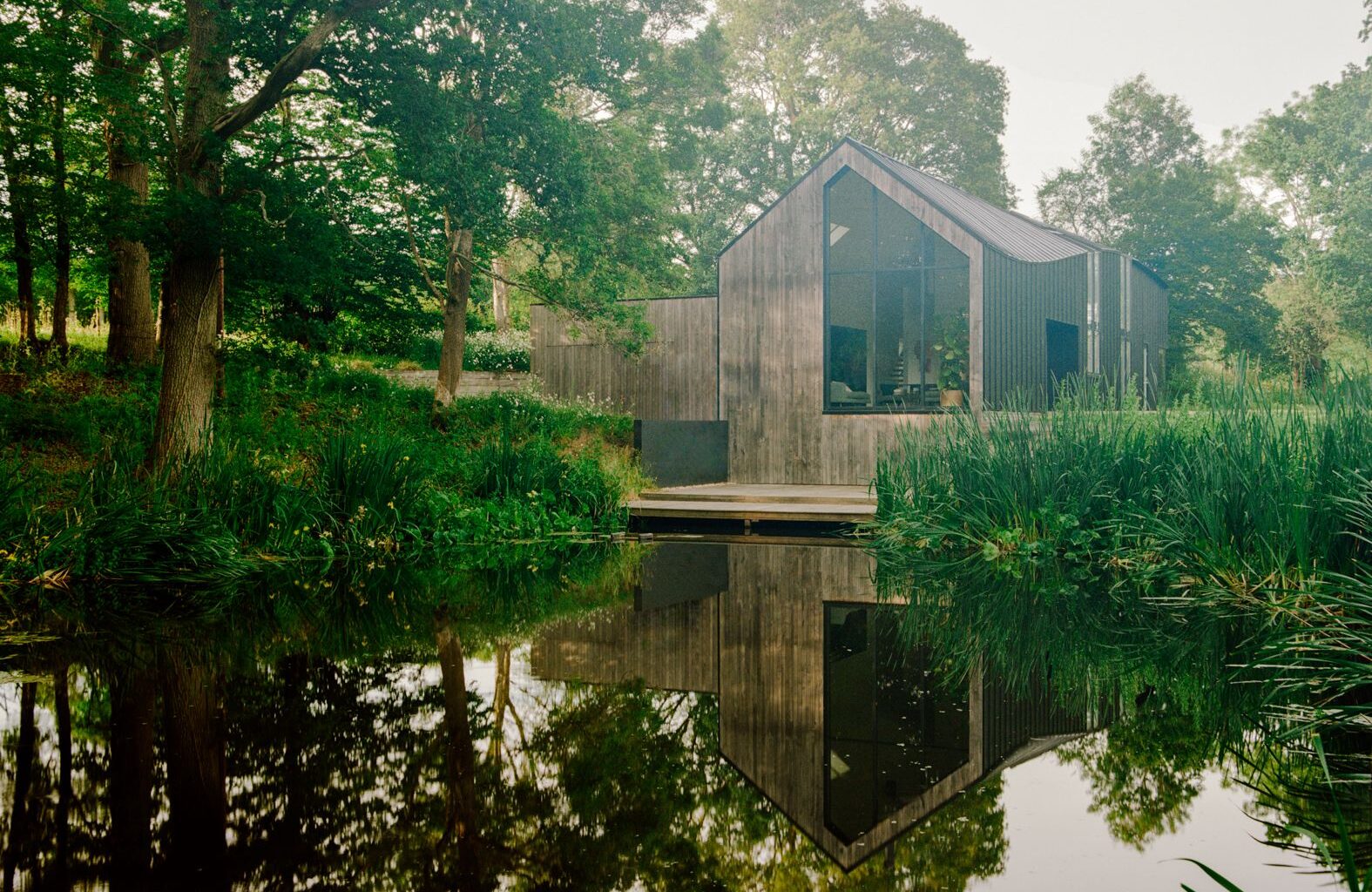 The Roof of This Barnlike U.K. Home Takes a Surprising Turn