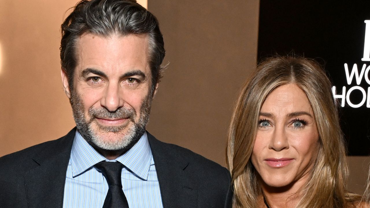 Jennifer Aniston Enlists Boyfriend Jim Curtis To Show Her Tips for Tackling Frizz