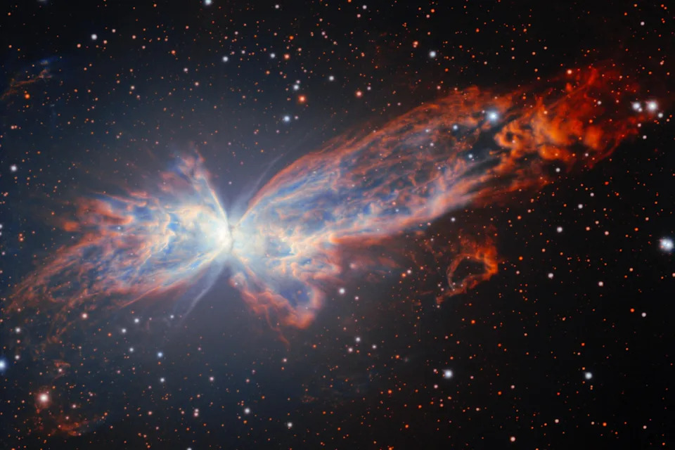 This image provided by NSF NOIRLab shows NGC 6302, a billowing planetary nebula that resembles a cosmic butterfly. / Credit: NSF NOIRLab via AP