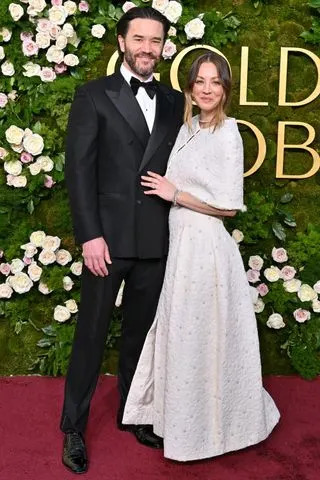 Axelle/Bauer-Griffin/FilmMagic Tom Pelphrey (left) and Kaley Cuoco attend the 82nd Annual Golden Globe Awards
