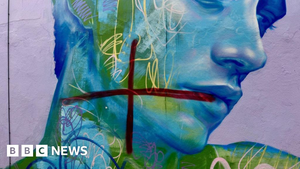 Weston-super-Mare street art graffitied with red crosses