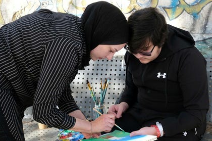 Haifa and Yamen Al-Najjar at the hospital. After doctors in Gaza were unable to diagnose him, he was transferred to East Jerusalem.