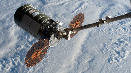 The Cygnus NG-17 above Earth in February 2022, spores aboard.