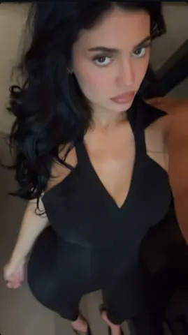 Instagram/Kylie Jenner Kylie Jenner wearing a plunging black catsuit