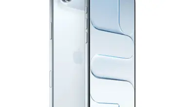 Apple iPhone with a silver back and screen displaying abstract design.