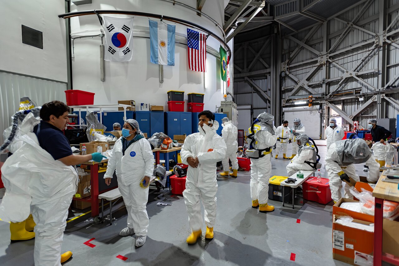 Gemini South team members suiting up.