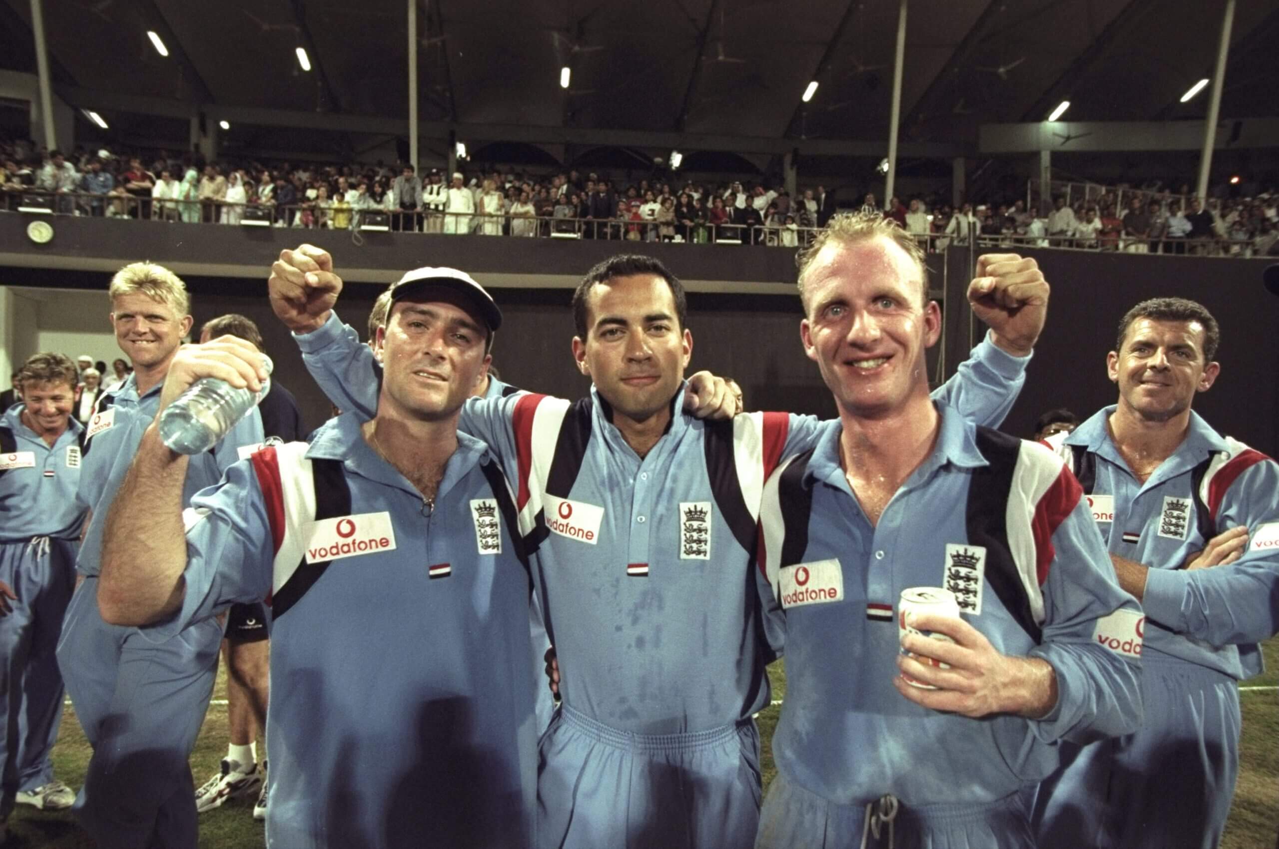 England's Graham Thorpe, Adam Hollioake and Matthew Fleming celebrate victory at the Singer Champions Trophy
