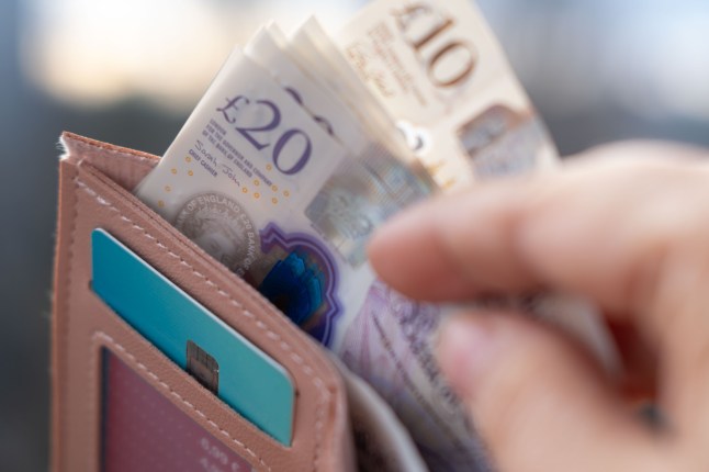 wallet with British GBP banknotes, cash in female hands, counting uk pounds bills, paper money, Money Management Accuracy, payments to fund, financial freedom, save up for vacation