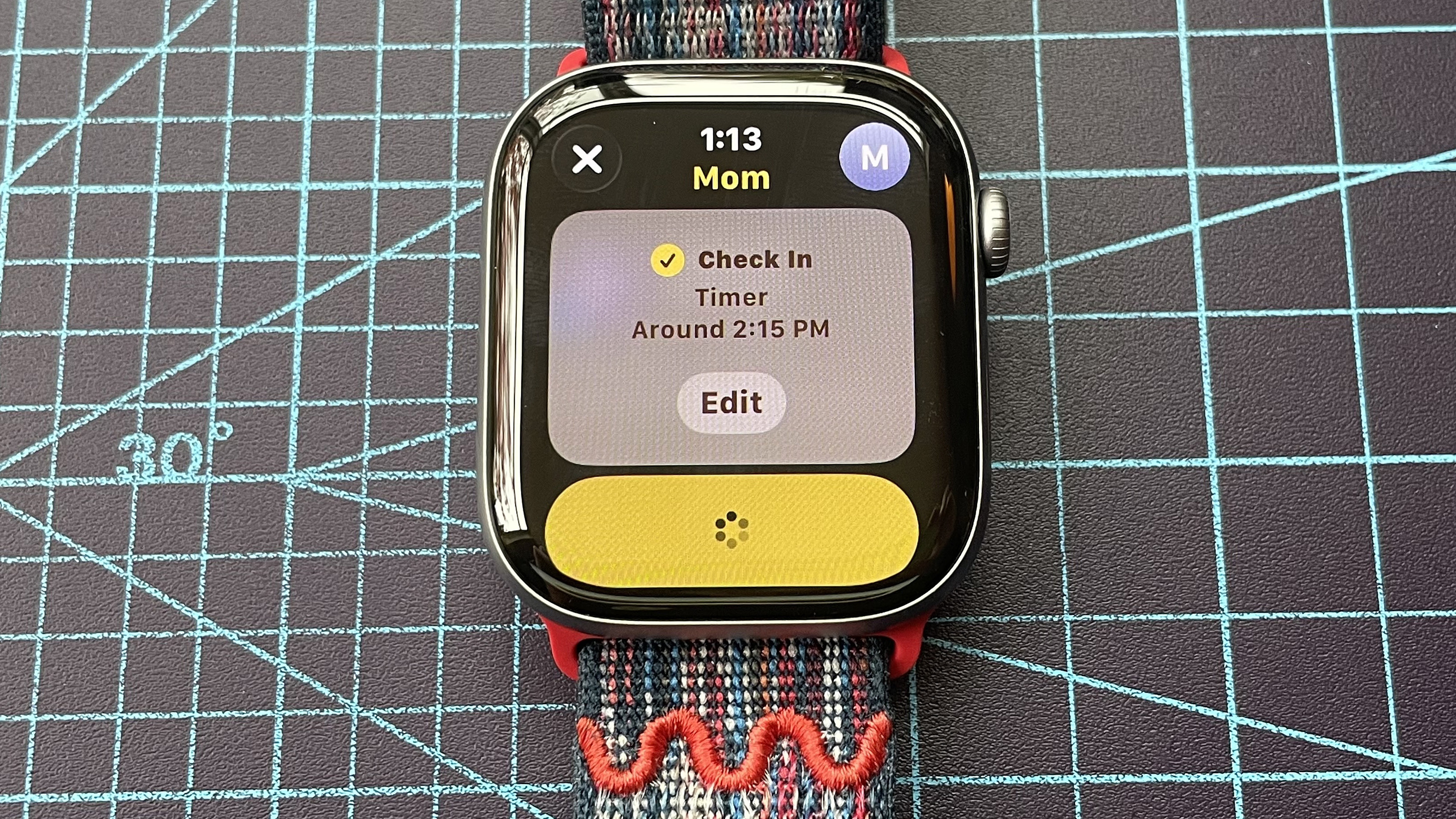Detail shot of an Apple Watch Series 11 showing the steps to set up and send a Check In safety notification in watchOS 26