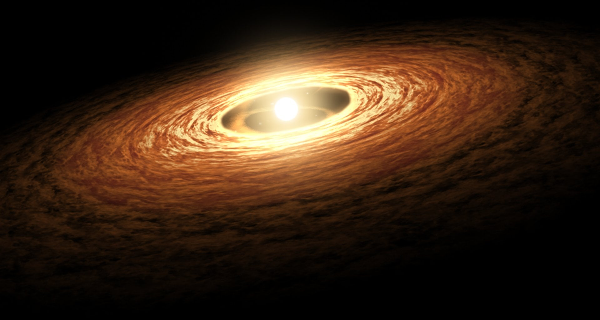 Artist's concept of a protoplanetary disc - one of the earliest steps in planet formation. Credit - NASA-JPL