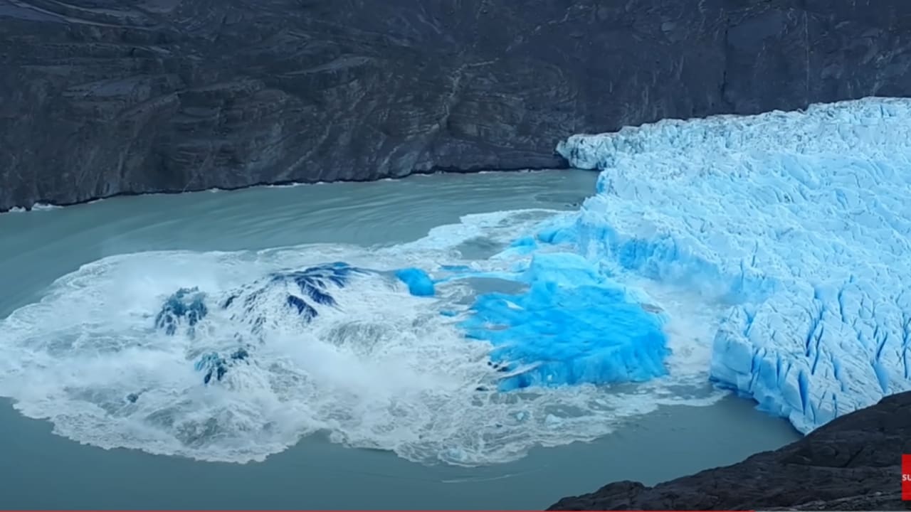 Huge Section Of Glacier Collapses Into Water (Watch)