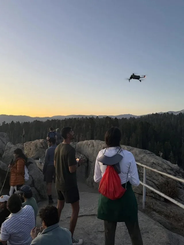 A visitor to Sequoia National Park captured a photo of someone flying a drone over Moro Rock and was looking to report the incident.